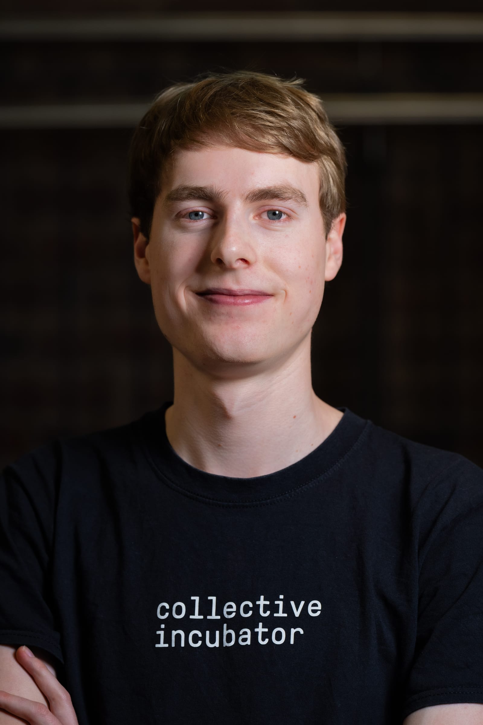 Portrait of Johannes Pungs wearing a Collective Incubator shirt